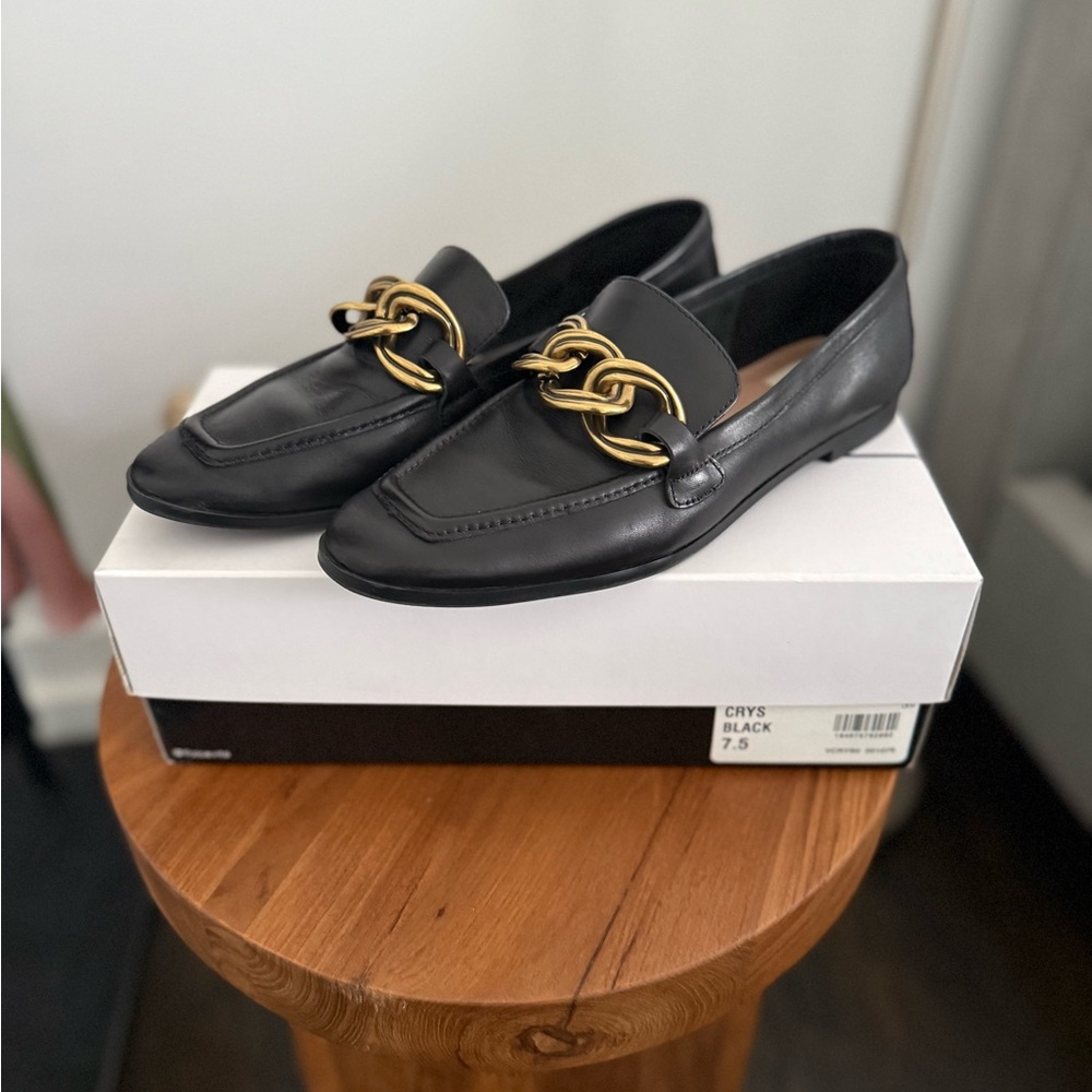 Dolce Vita Black Loafers with Gold Chain Accent